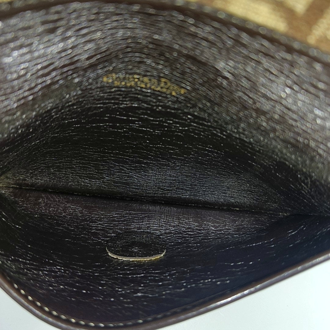 Oblique Canvas Clutch Brown