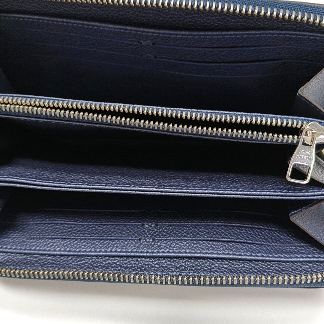 ZIPPY Monogram Calfskin Blue Wallet
