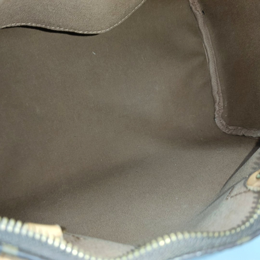 Authenticated pre-owned  SPEEDY 30 Monogram Coated Canvas Brown - Top Handle Bag at Looply
