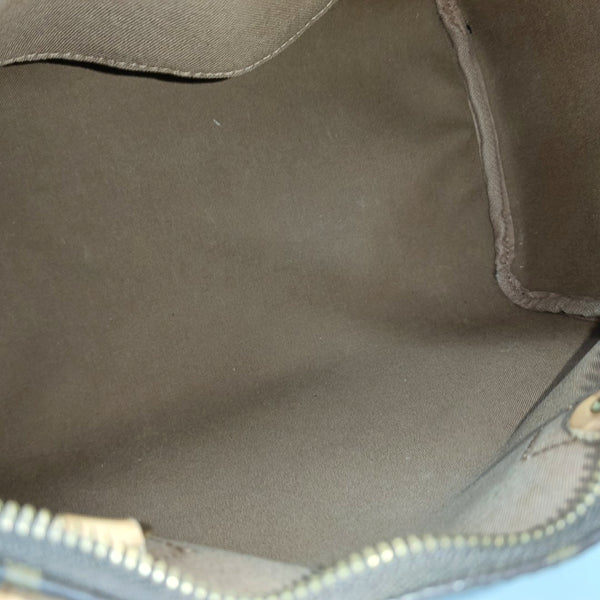 Authenticated pre-owned  SPEEDY 30 Monogram Coated Canvas Brown - Top Handle Bag at Looply