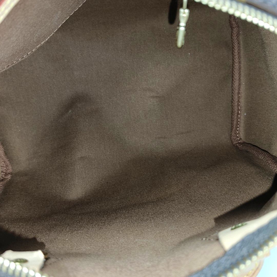 SPEEDY 25 Monogram Coated Canvas Brown