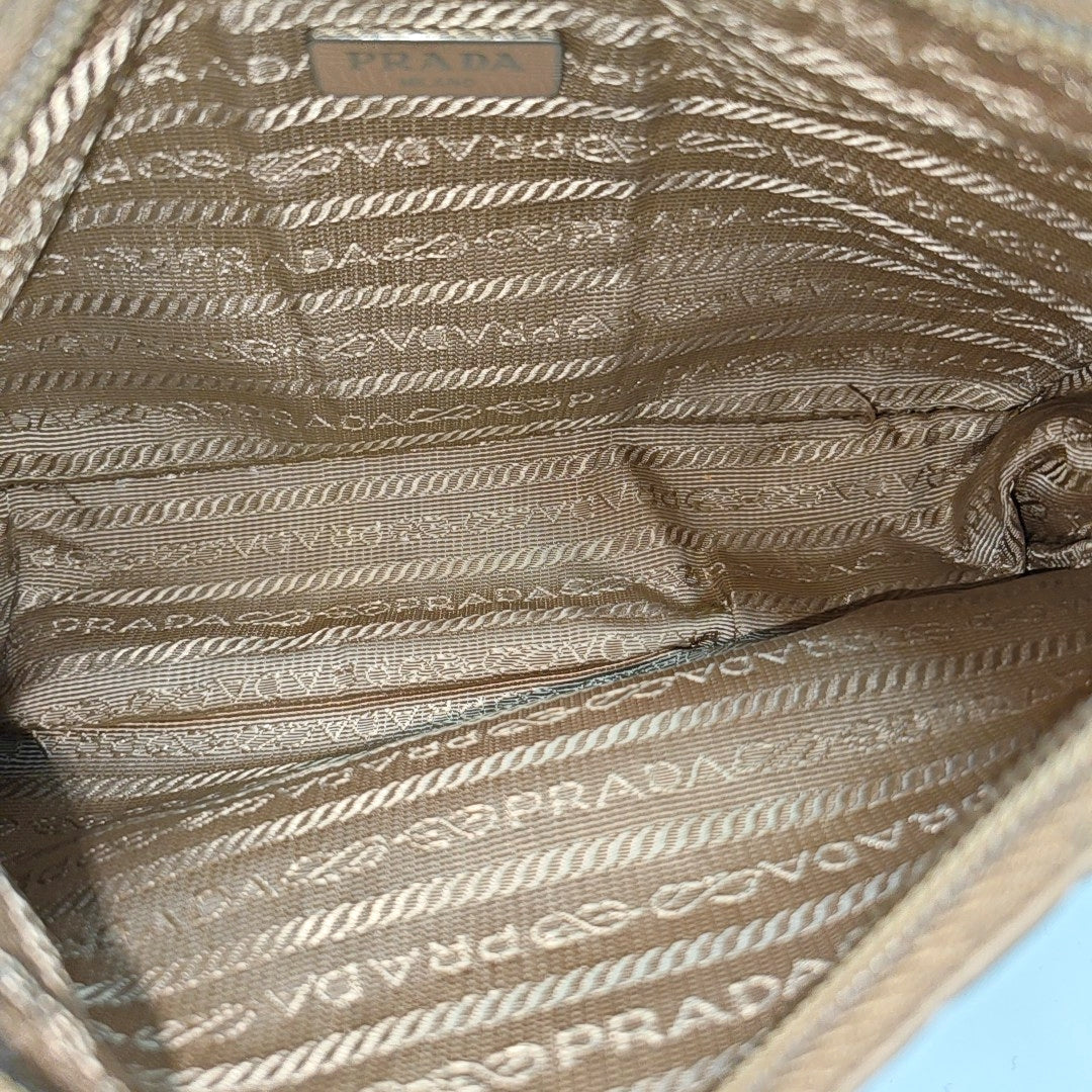 Authenticated pre-owned  Re-Edition2000 Mini Nylon Beige - Top Handle Bag at Looply
