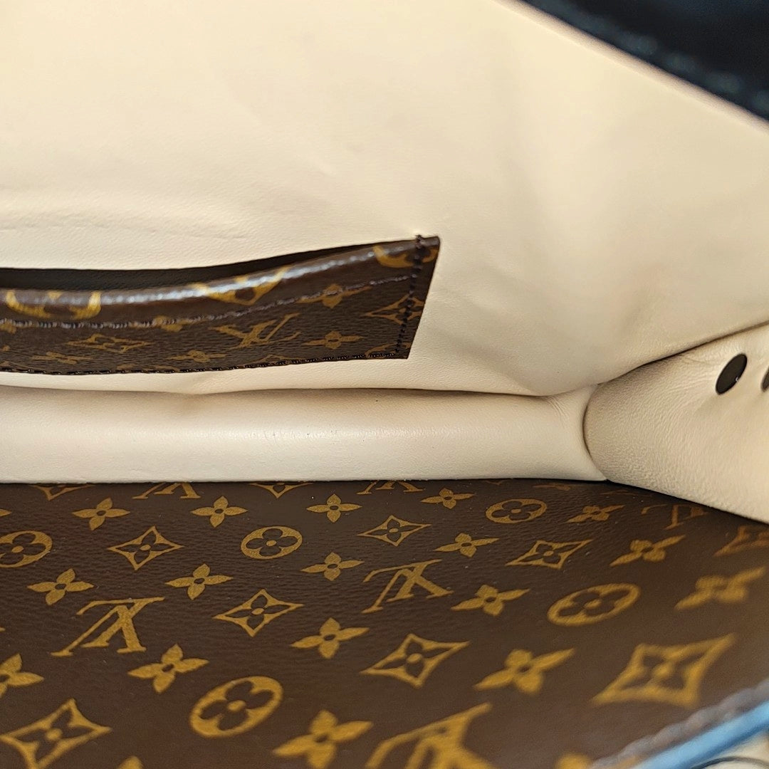 TRUNK Monogram Coated Canvas Brown