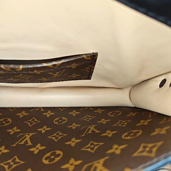 TRUNK Monogram Coated Canvas Brown