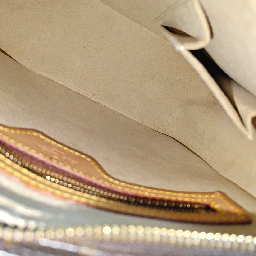 LOOPING MM Monogram Coated Canvas Brown