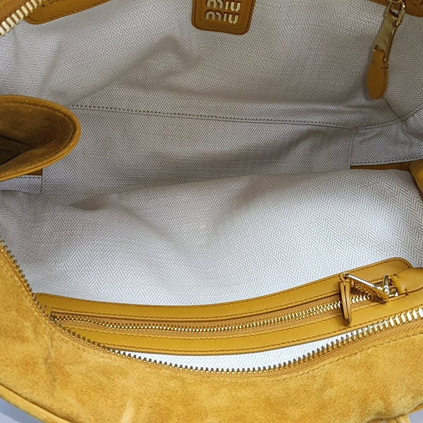 Authenticated pre-owned  Beau Suede Yellow - Top Handle Bag at Looply