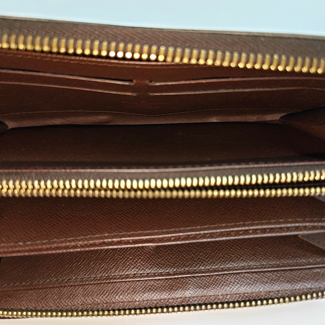 ZIPPY Damier Ebene Coated Canvas Brown Wallet