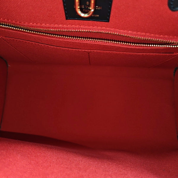 ONTHEGO MM Monogram Coated Canvas Brown