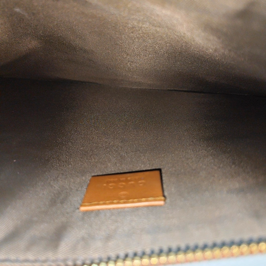Monogram Coated Canvas Clutch Beige