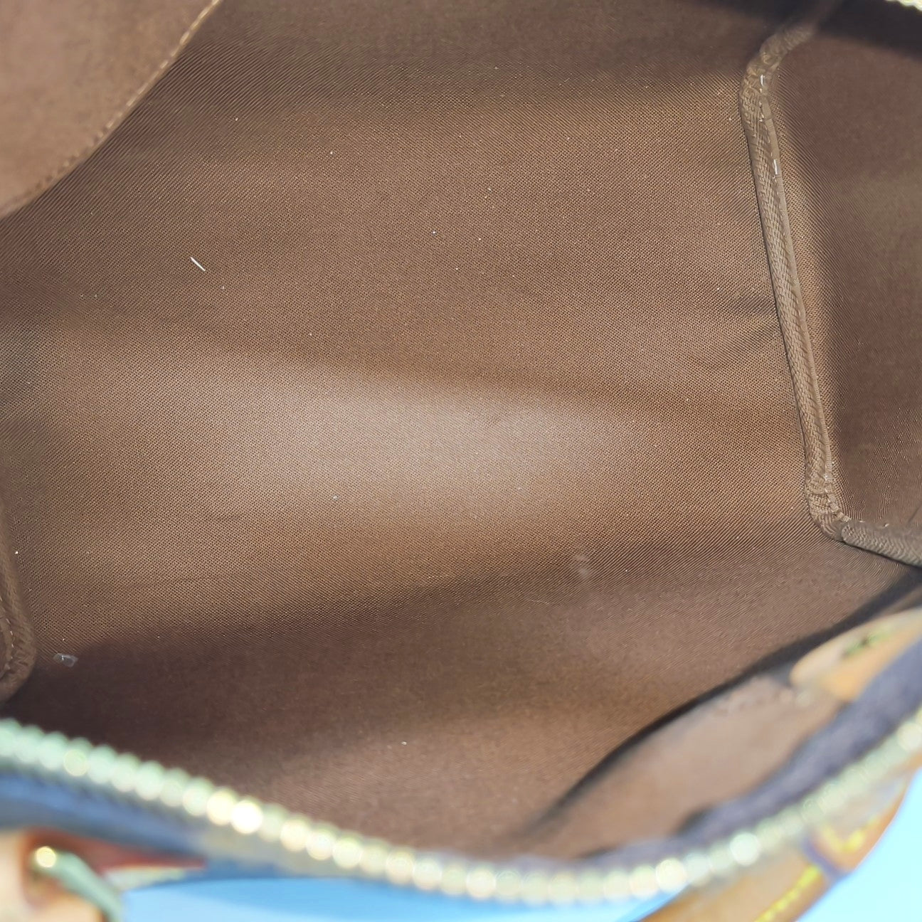 SPEEDY 30 Monogram Coated Canvas Brown