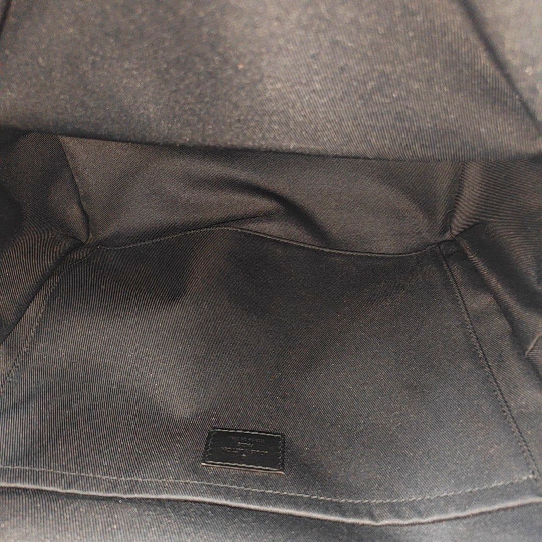 Monogram Coated Canvas Backpack Brown