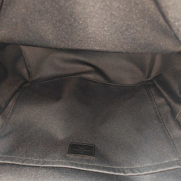 Monogram Coated Canvas Backpack Brown