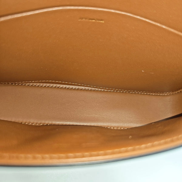 TRIOMPHE Small Coated Canvas Brown