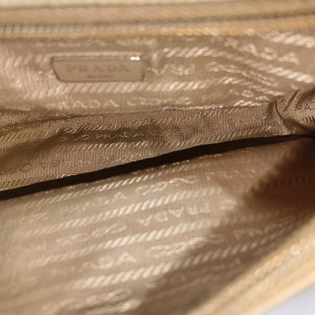 Authenticated pre-owned  Re-Edition2000 Mini Nylon Beige - Top Handle Bag at Looply