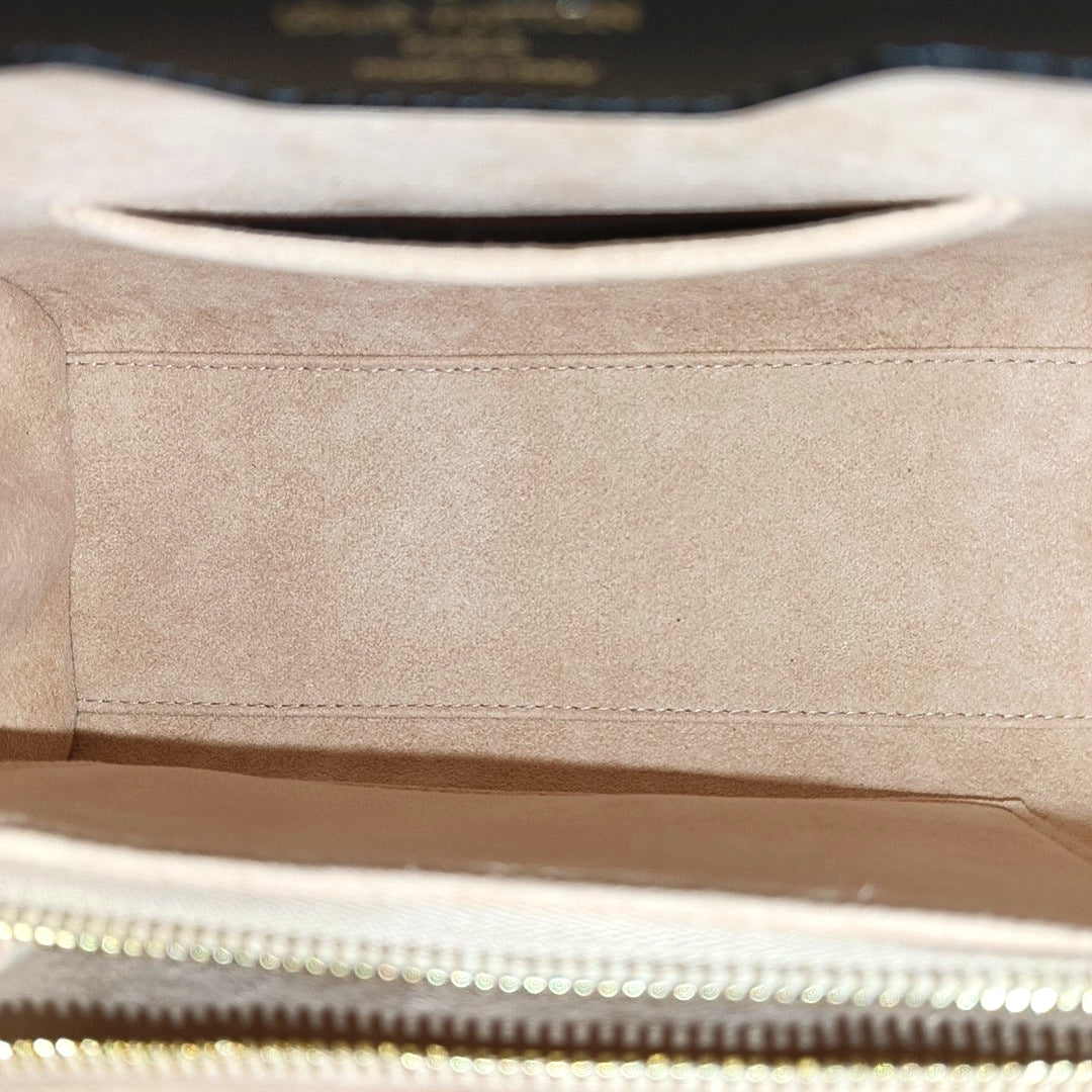 TRIANON PM Monogram Coated Canvas Brown