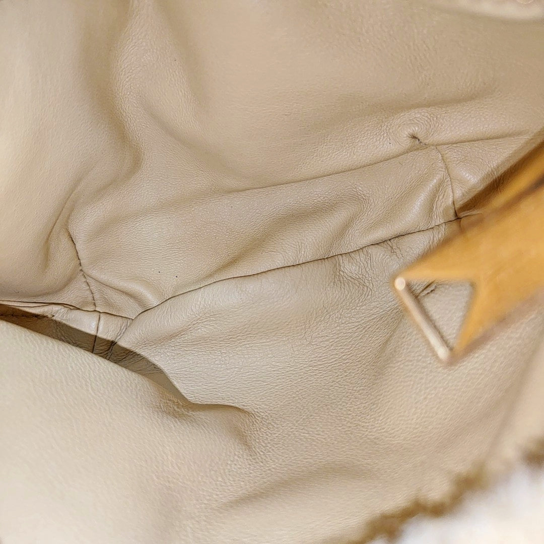 Authenticated pre-owned  Jodie Mini Sheepskin Yellow - Top Handle Bag at Looply