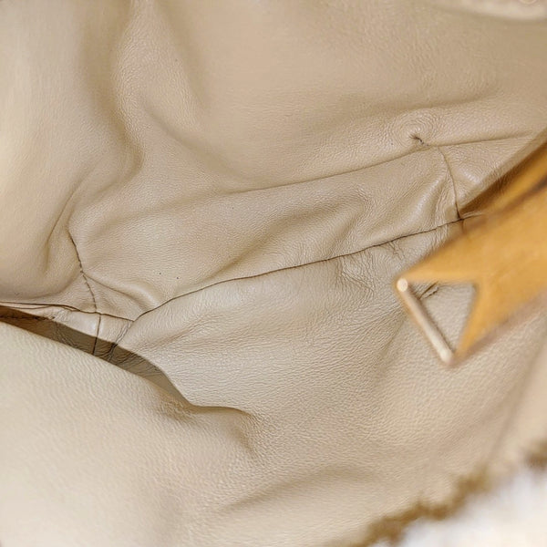 Authenticated pre-owned  Jodie Mini Sheepskin Yellow - Top Handle Bag at Looply
