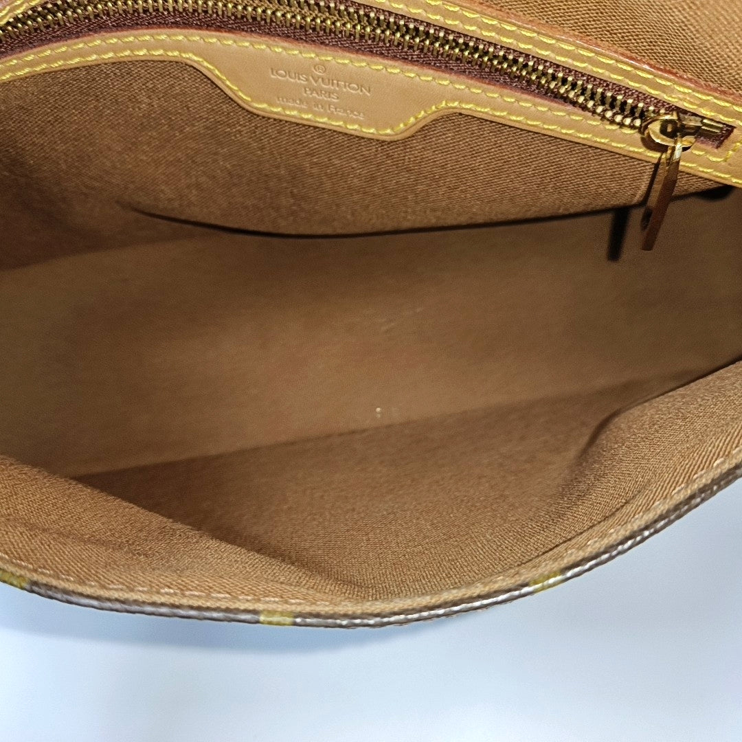 LOOPING PM Monogram Coated Canvas Brown