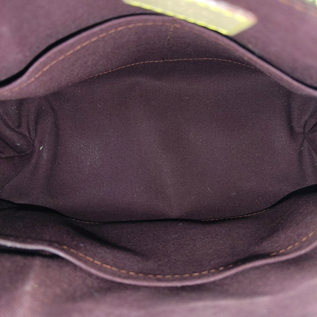 RIVOLI BB Monogram Coated Canvas Brown