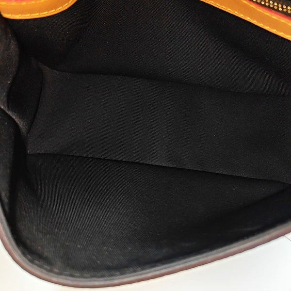 DIANE Monogram Coated Canvas Brown