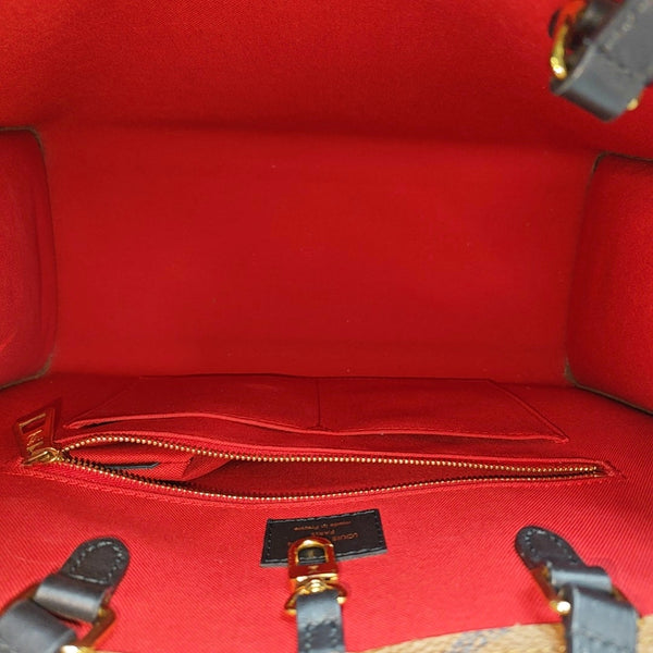 ONTHEGO MM Monogram Coated Canvas Brown