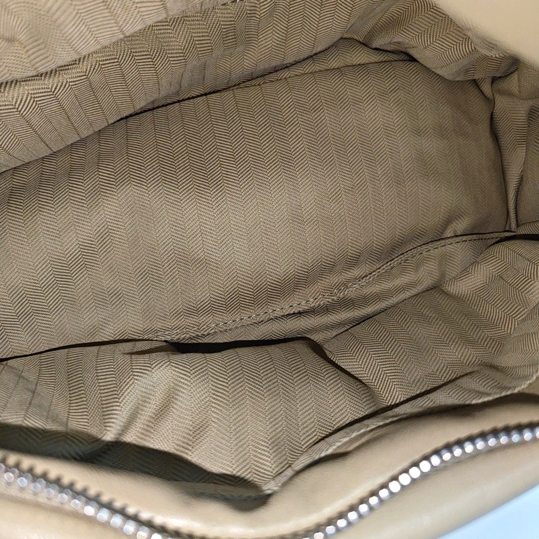 Authenticated pre-owned  Puzzle Quilted Lambskin Green - Top Handle Bag at Looply
