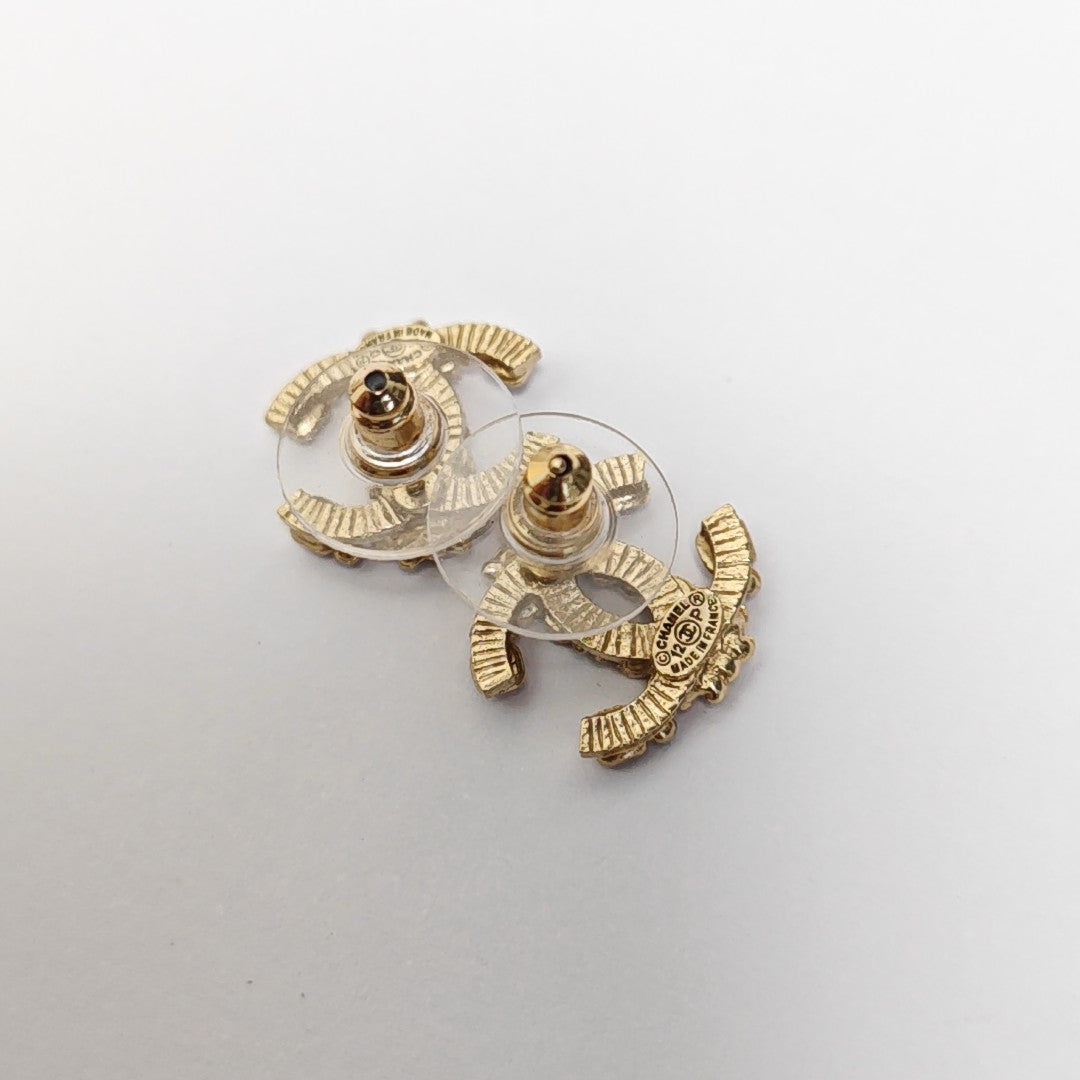 Pendientes CC en tono dorado, metal, otros dorados