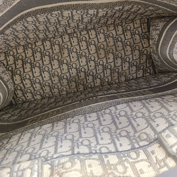 Authenticated pre-owned  Book Tote Large Monogram Canvas Grey - Tote Bag at Looply