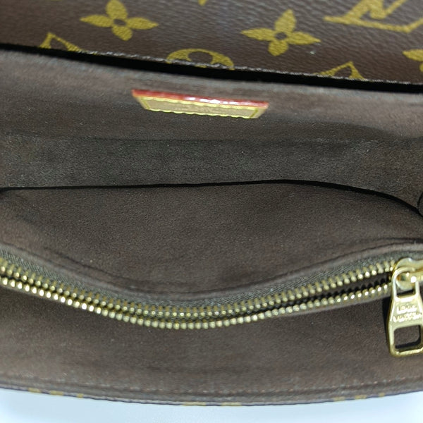 MÉTIS EAST WEST Monogram Coated Canvas Brown