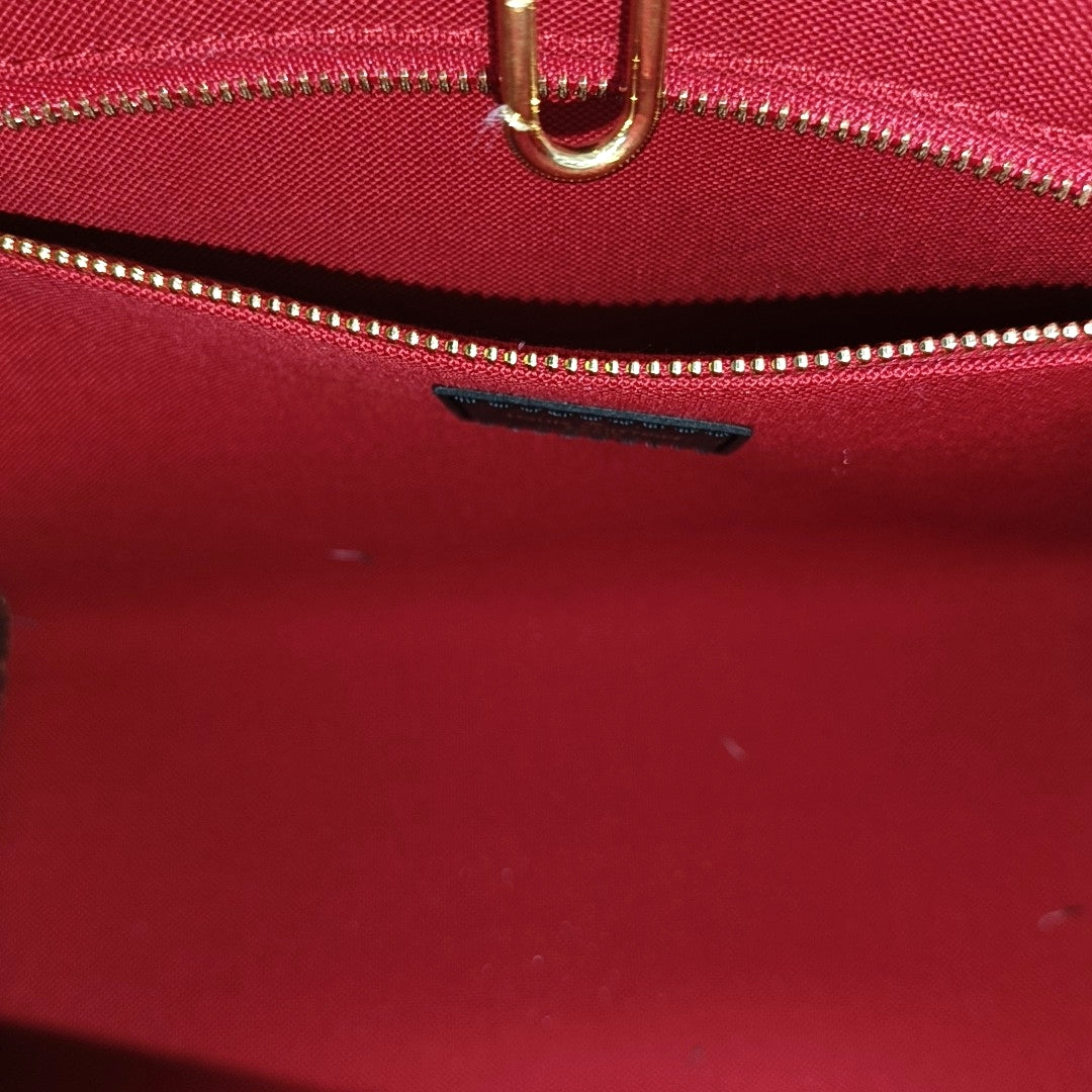 ONTHEGO PM Monogram Coated Canvas Brown
