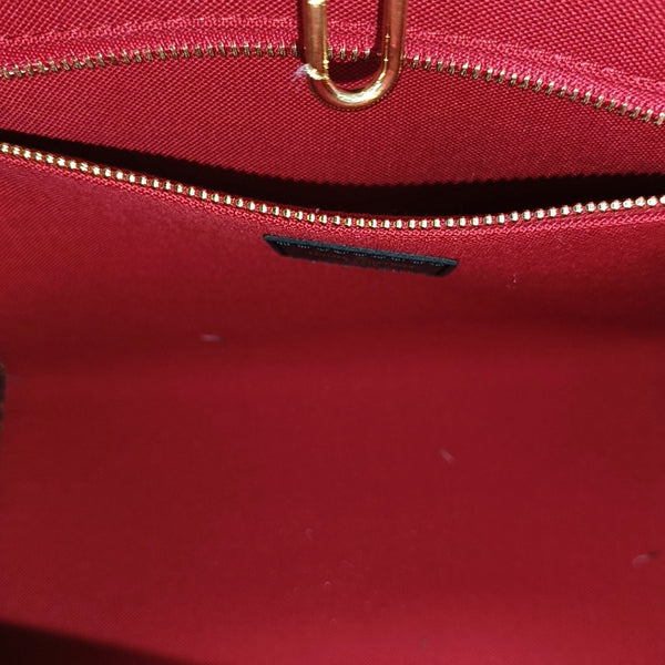 ONTHEGO PM Monogram Coated Canvas Brown