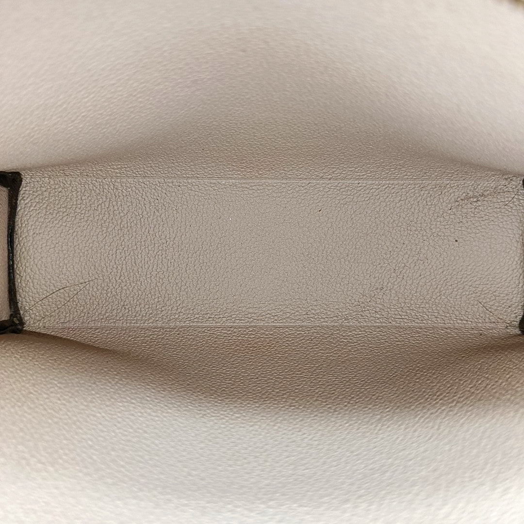 TOILET POCKET 19 Monogram Coated Canvas Brown