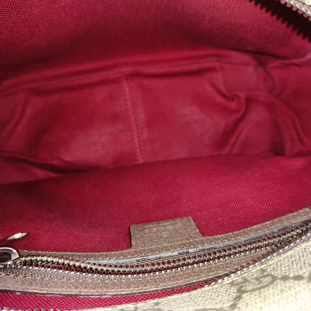 Trunk Monogram Coated Canvas Brown