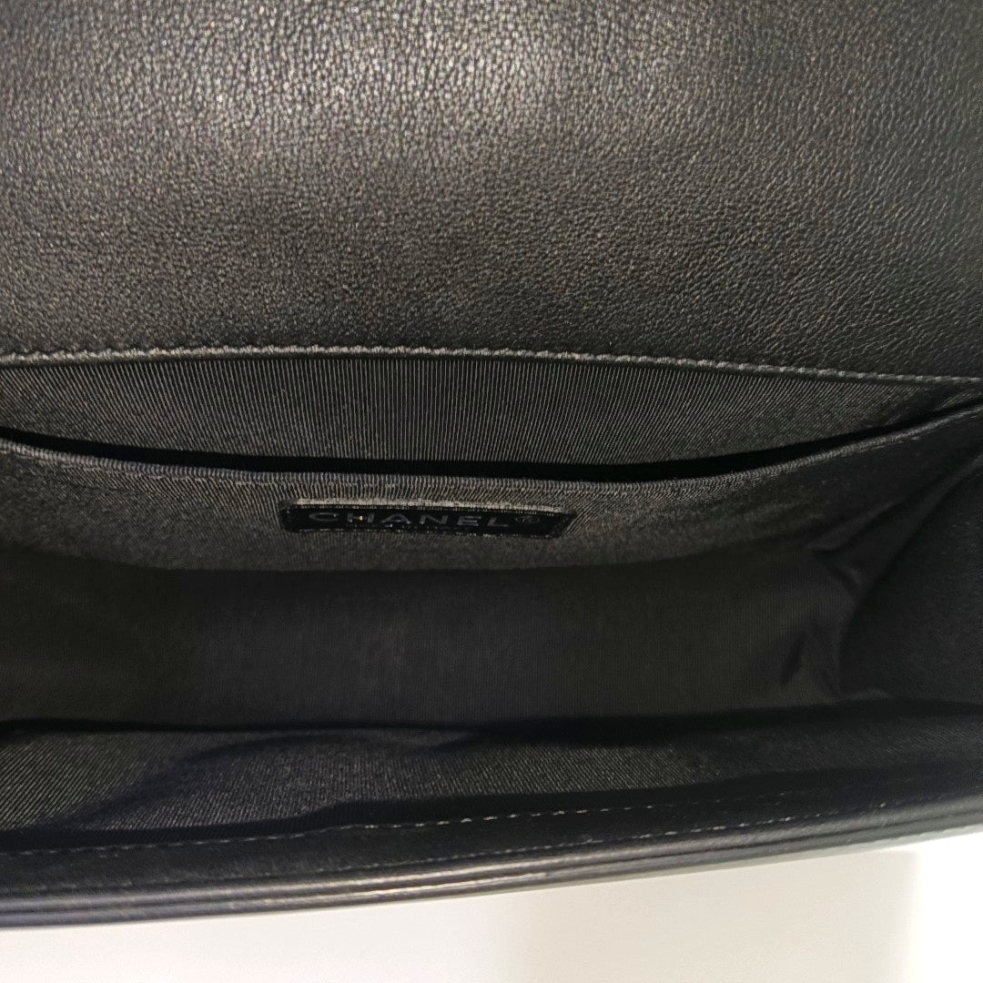 Authenticated pre-owned  BOY CHANEL Medium Quilted Patent Leather Black - Shoulder Bag at Looply