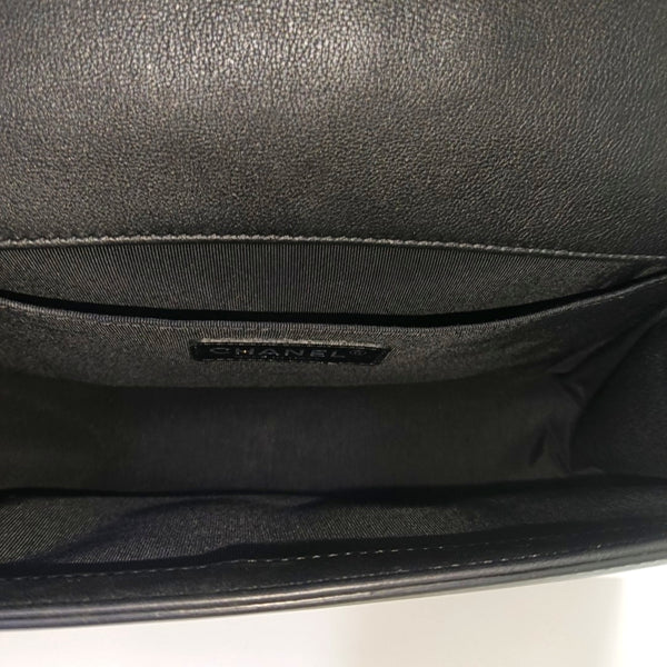 Authenticated pre-owned  BOY CHANEL Medium Quilted Patent Leather Black - Shoulder Bag at Looply