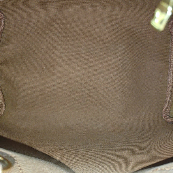 SPEEDY 25 Monogram Coated Canvas Brown
