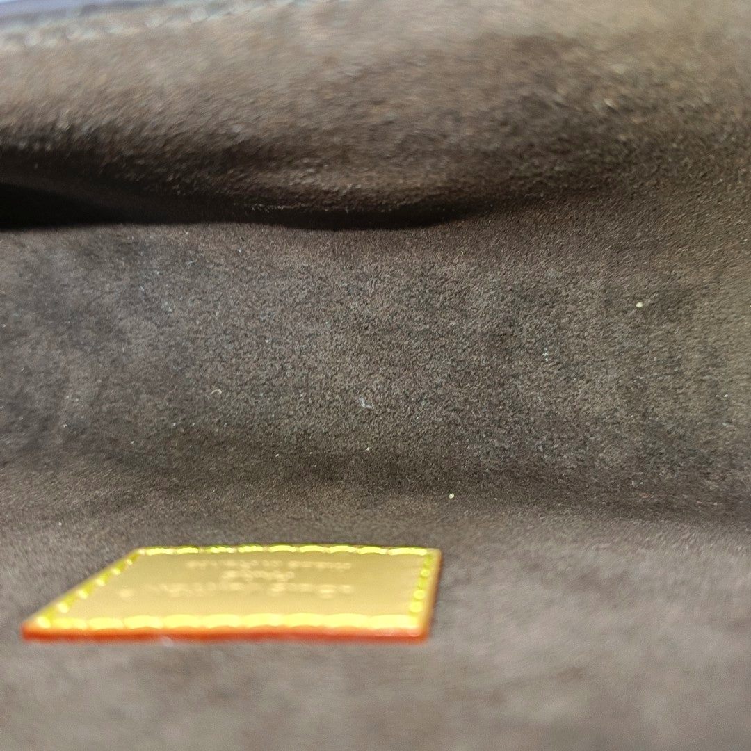 Pochette Camille Monogram Coated Canvas Brown