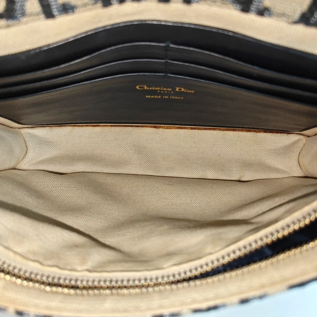 Authenticated pre-owned  Saddle Monogram Canvas Blue - Shoulder Bag at Looply