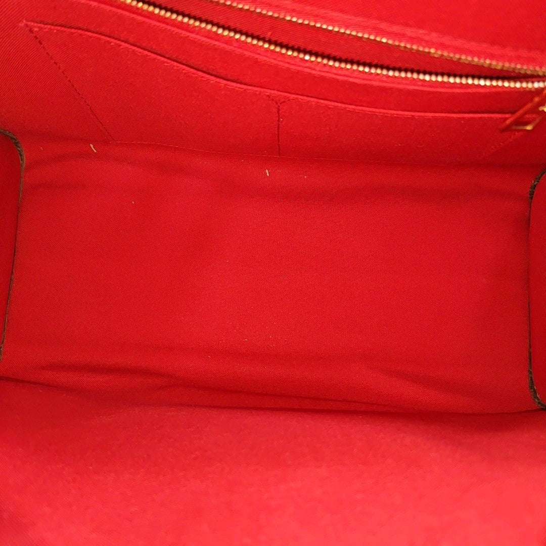 ONTHEGO MM Monogram Coated Canvas Brown