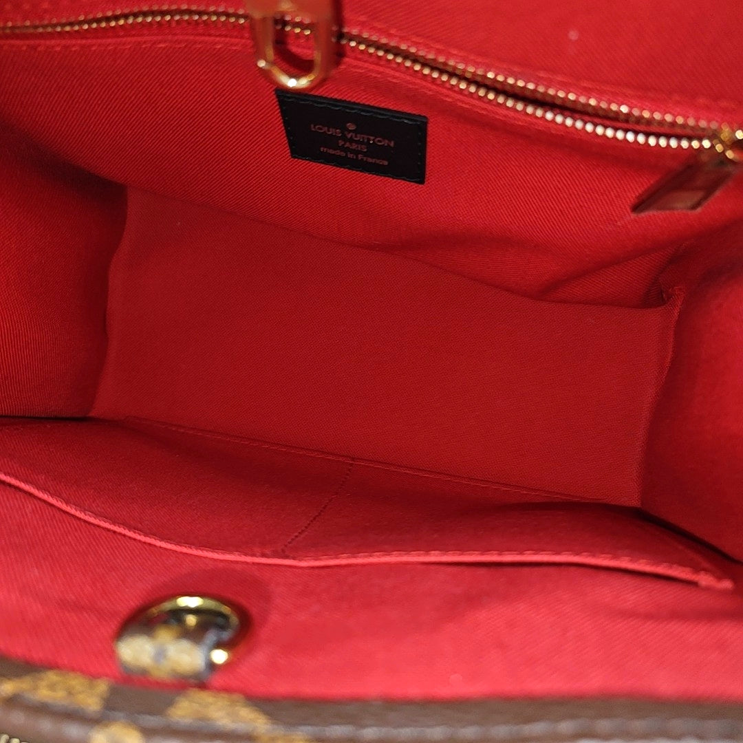ONTHEGO PM Monogram Coated Canvas Brown
