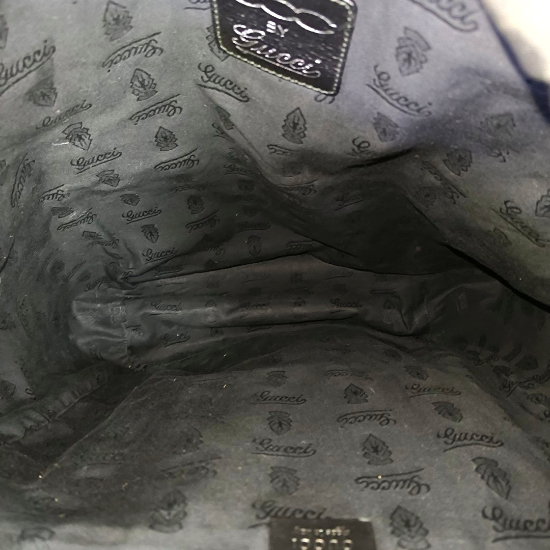 Monogram Coated Canvas Backpack Black