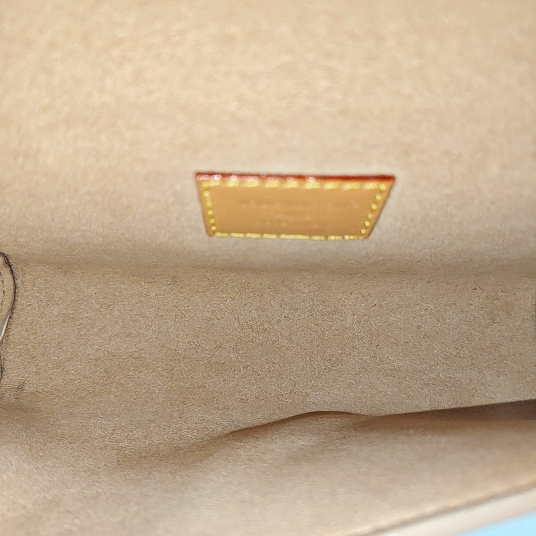 Pochette Camille Monogram Coated Canvas Beige