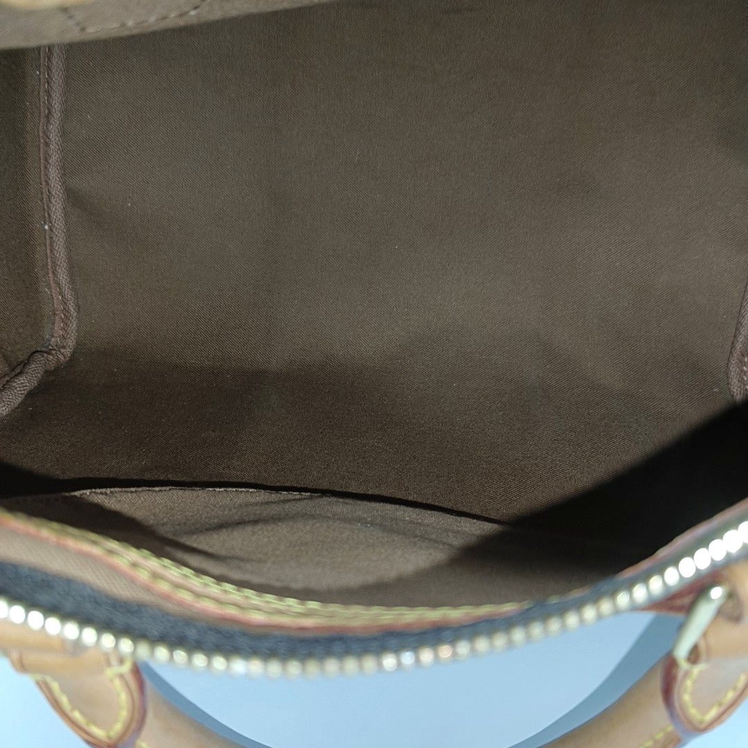 SPEEDY 30 Monogram Coated Canvas Brown