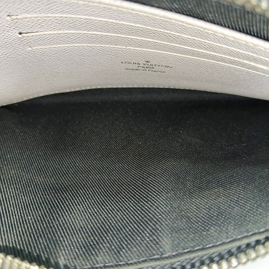 DISCOVERY Monogram Coated Canvas White