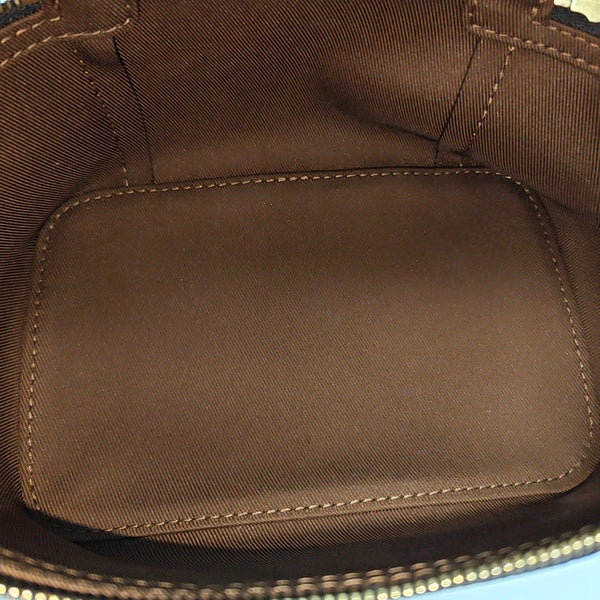 Monogram Coated Canvas Clutch Brown