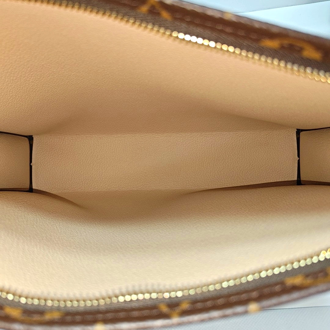 TOILET POCKET 26 Monogram Coated Canvas Brown