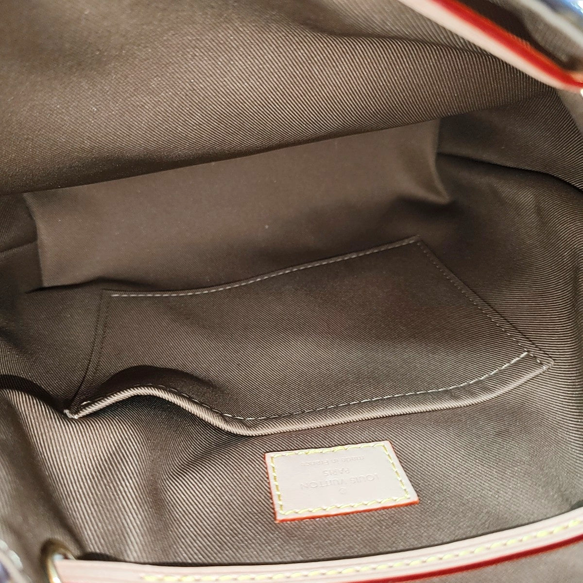 EXCURSION PM Monogram Coated Canvas Brown