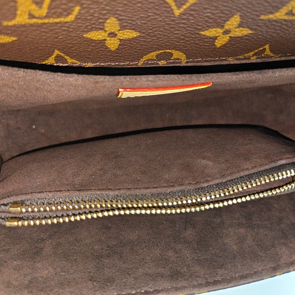 MÉTIS EAST WEST Monogram Coated Canvas Brown