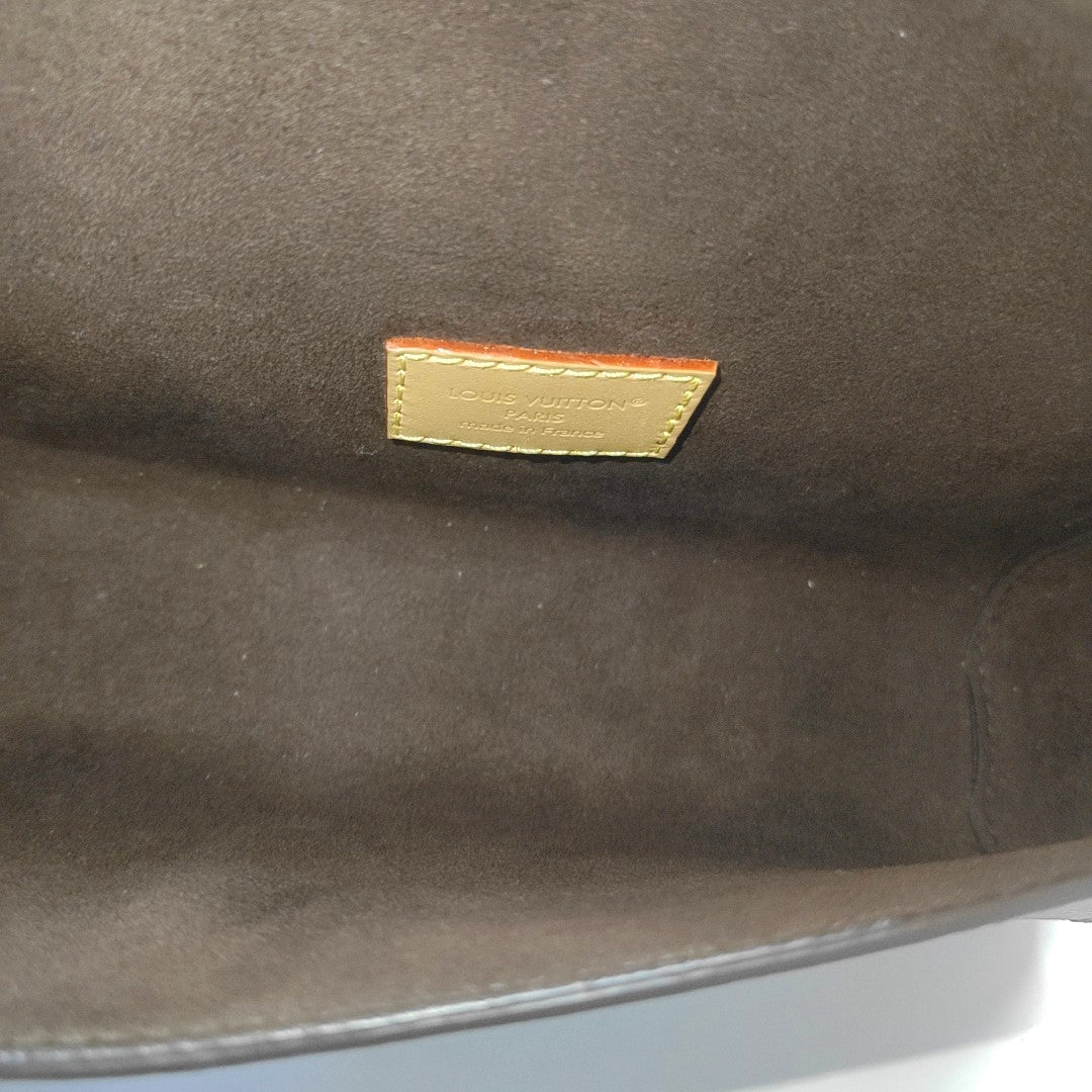 Pochette Camille Monogram Coated Canvas Brown