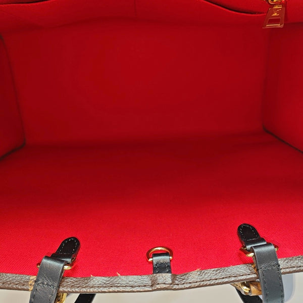 ONTHEGO GM Monogram Coated Canvas Brown
